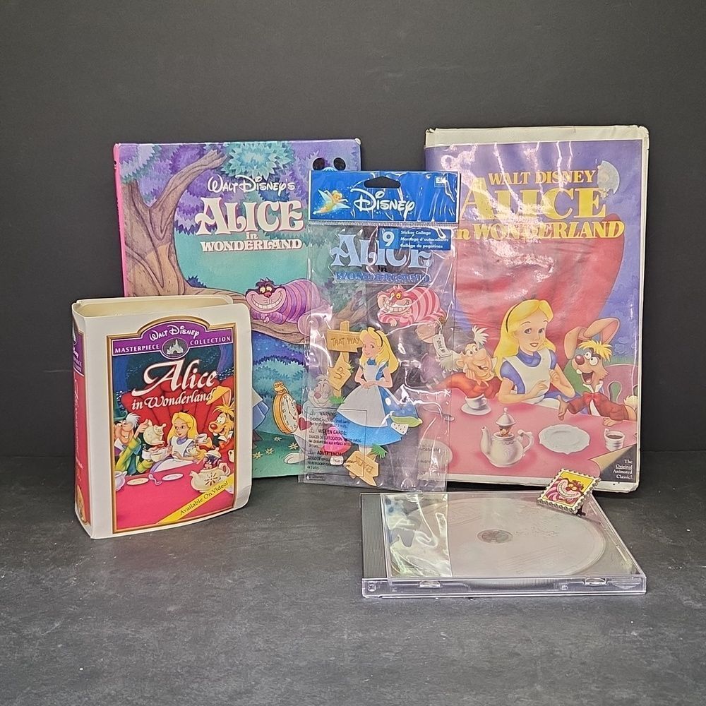 Alice in Wonderland 1 vhs 1 dvd movie, 1 book, Happy‎ Meal Toy, Stickers, Pin